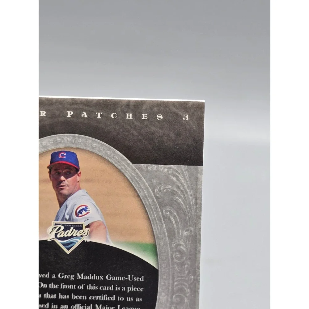 2007 Upper‎ Deck Premier Patches Greg Maddux Triple Relic Jersey 76/87 Padres